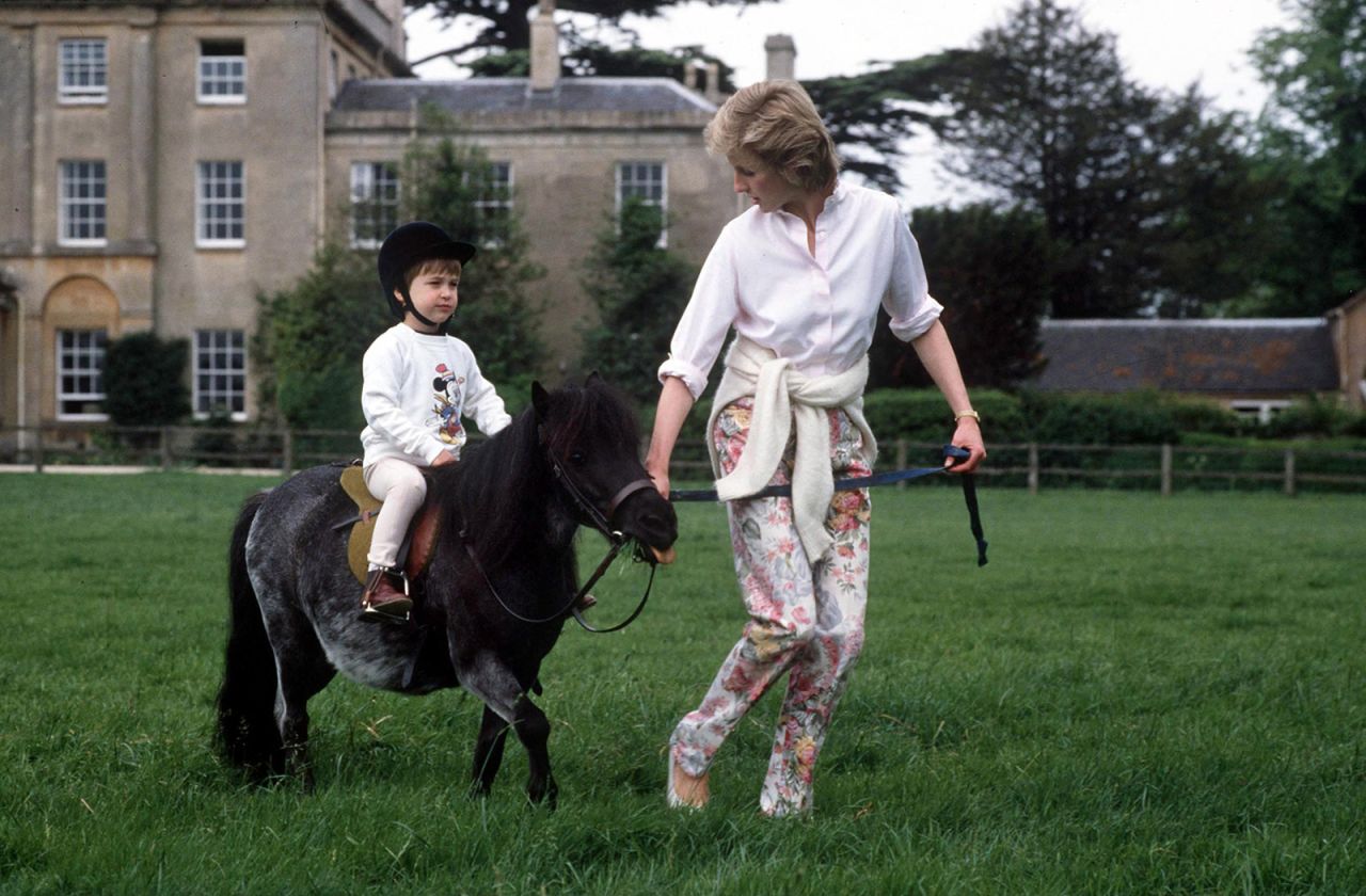 William rides a miniature pony at Highgrove House. 