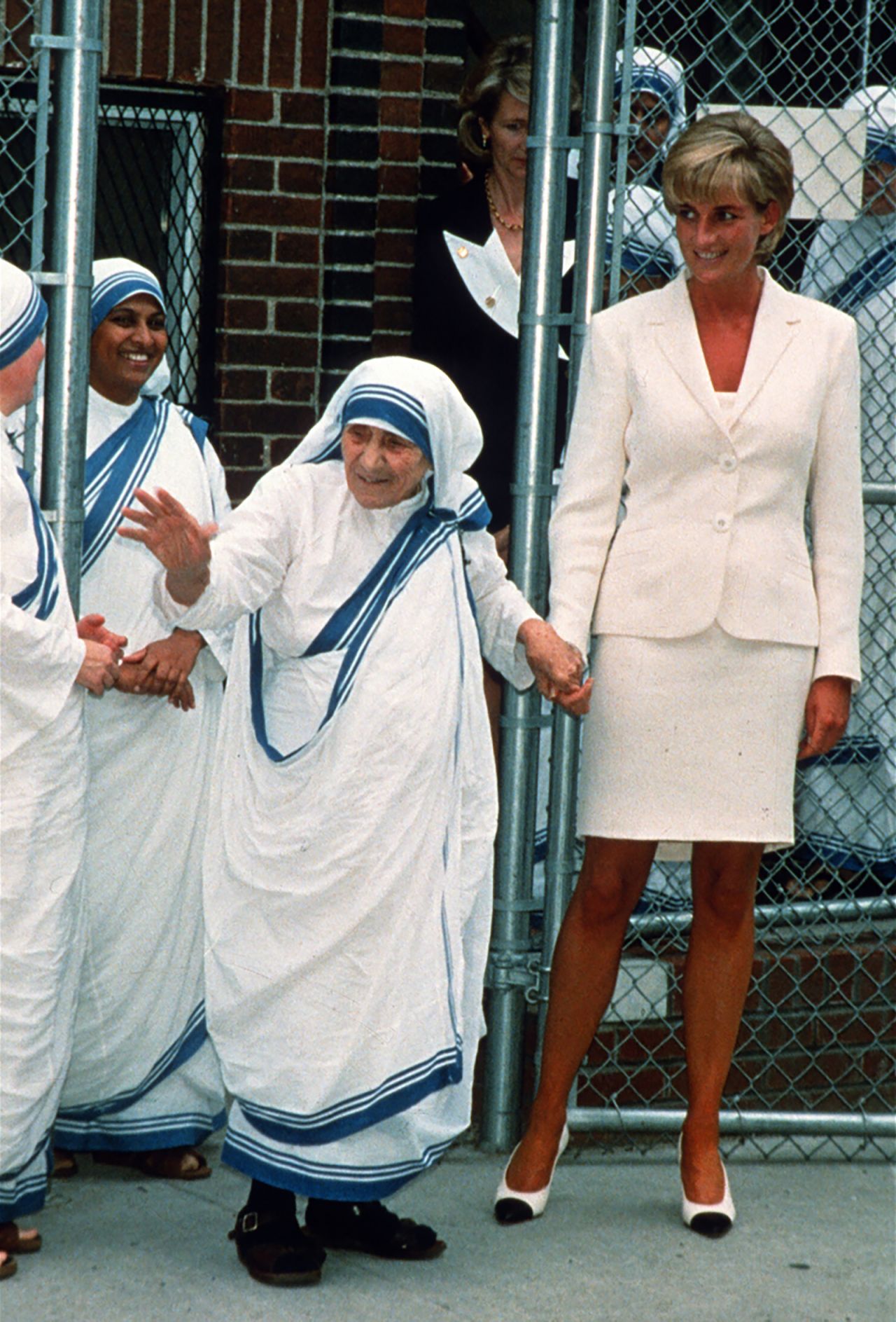 Diana holds hands with Mother Teresa after they met in New York in June 1997. 