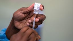 HARARE, ZIMBABWE - MAY 12: A nurse draws the Covid-19 Vaccine Covaxin out of its vial before vaccination at a Hospital on May 12, 2021 in Harare, Zimbabwe. Zimbabwe was the first African country to approve the Covaxin Covid-19 vaccine, developed by Bharat Biotech International. (Photo by Tafadzwa Ufumeli/Getty Images)