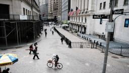 NEW YORK, NEW YORK - MAY 11: People walk by the New York Stock Exchange after global stocks fell as concerns mount that rising inflation will prompt central banks to tighten monetary policy on May 11, 2021 in New York City. By mid afternoon the tech-heavy Nasdaq Composite had lost 0.6% after falling 2.2% at its session low.  (Photo by Spencer Platt/Getty Images)