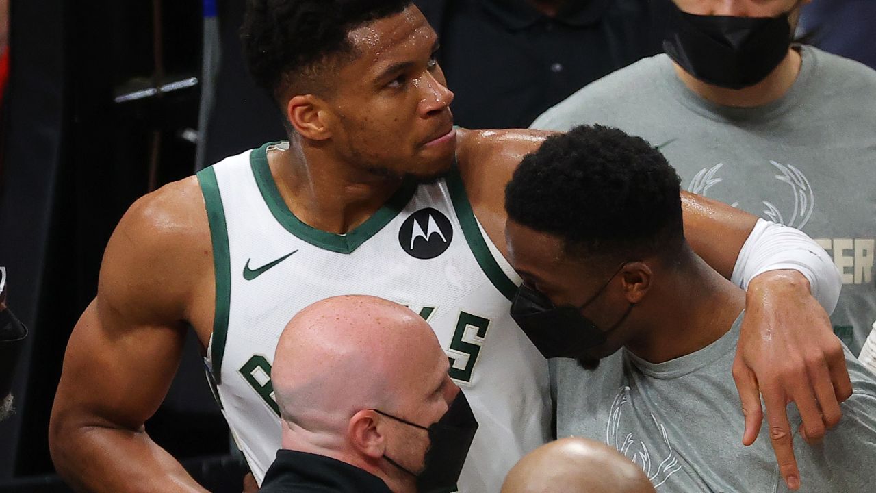 Giannis Antetokounmpo is helped off the court after being injured during Game 4 of the Eastern Conference Finals. 