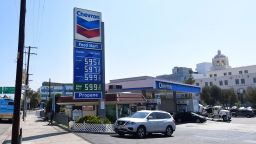 Some of the highest gas prices in town are posted on a signboard at a gas station in downtown Los Angeles, California on June 22, 2021, as gasoline prices rise.