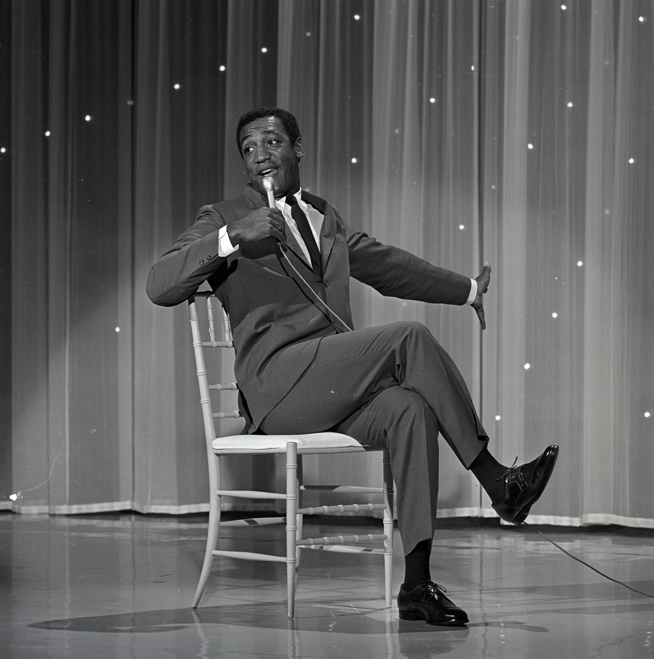 Cosby, shown here in 1965, began his career in New York nightclubs as a standup comedian. His clean-cut style became a career mainstay.