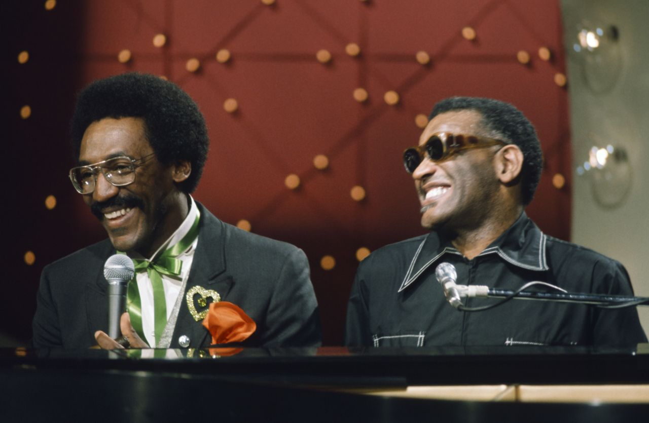 Cosby sits with music legend Ray Charles during "The Midnight Special" program that aired in March 1973.