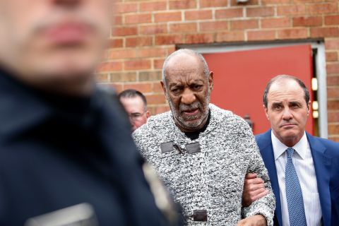 Cosby leaves a courthouse in Elkins Park, Pennsylvania, after he was arraigned on charges of aggravated indecent assault in December 2015. Cosby was accused of drugging and sexually assaulting Andrea Constand at his home in 2004.
