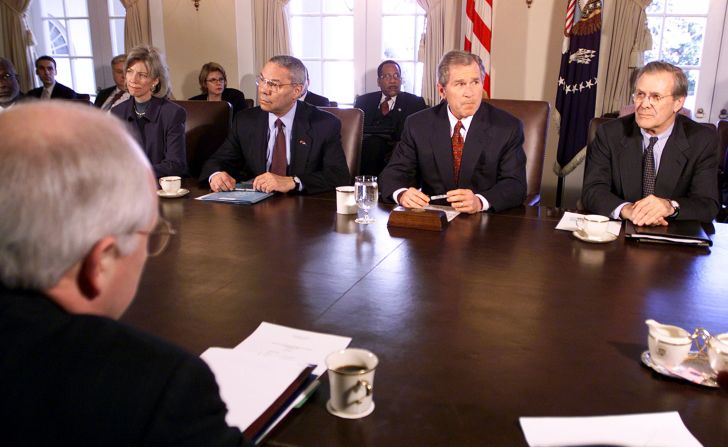 President George W. Bush is flanked by Rumsfeld and Secretary of State Colin Powell shortly after taking office in January 2001. Rumsfeld was beginning his second stint as secretary of defense. He and Powell <a href="index.php?page=&url=https%3A%2F%2Fedition.cnn.com%2F2003%2FALLPOLITICS%2F04%2F07%2Ftimep.reconstruction.tm%2Findex.html" target="_blank">were often at odds on US foreign policy.</a>