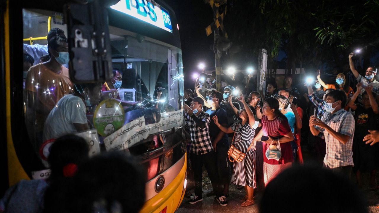 Relatives greet their loved ones who were released from the Insein prison in Yangon on June 30, following a surge in arrests of protesters since the February military coup. 