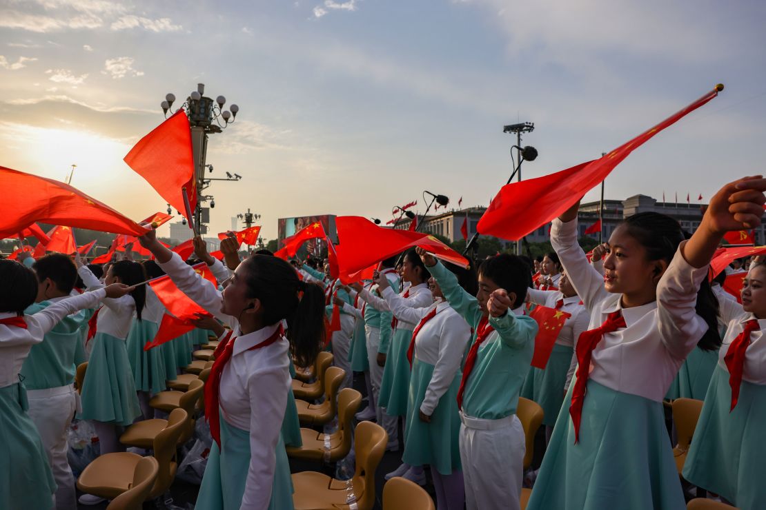 Chinese students from a choir perform during the celebration marking the 100th anniversary of the founding of the Chinese Communist Party at Tiananmen Square on July 1 in Beijing, China.