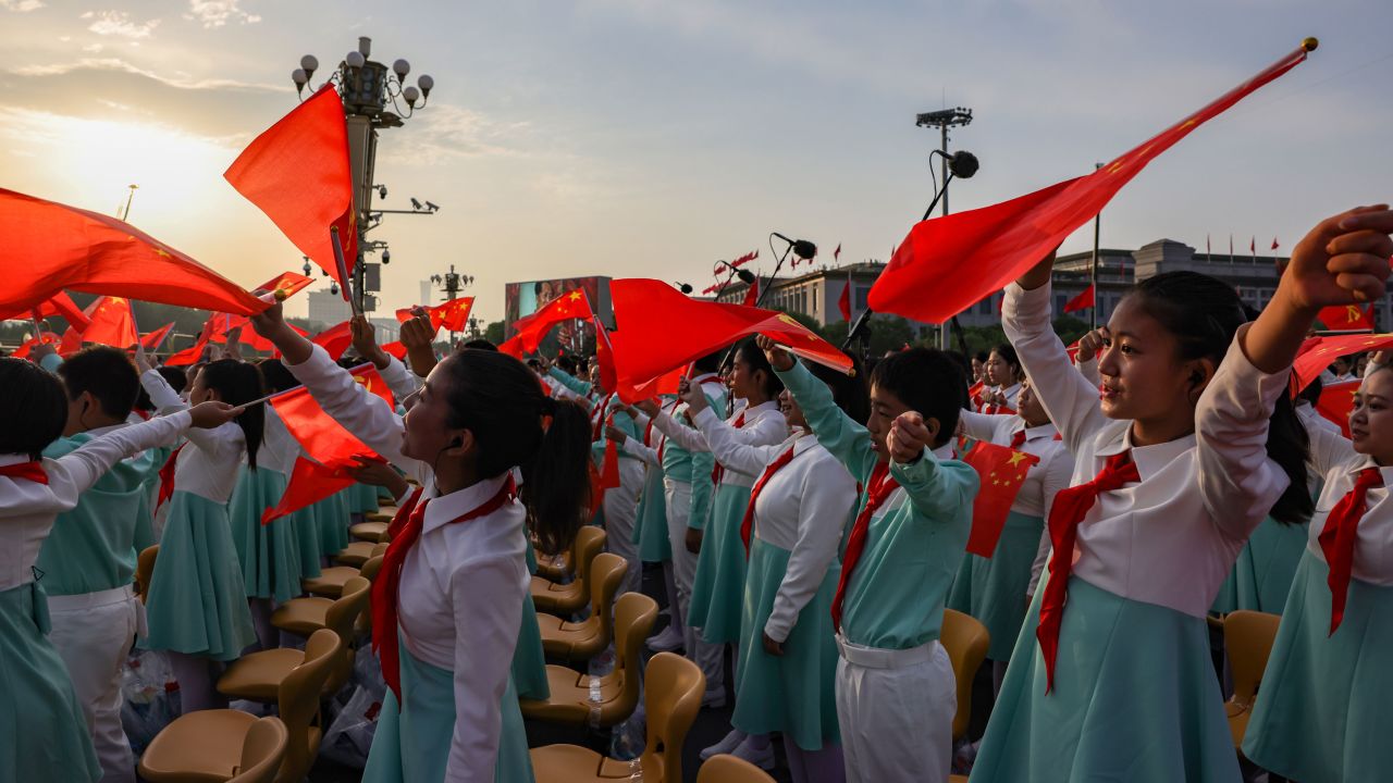 Chinese students from a choir perform during the celebration marking the 100th anniversary of the founding of the Chinese Communist Party at Tiananmen Square on July 1 in Beijing, China.