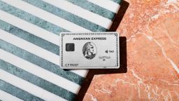 underscored american express platinum on stripes marble backgrounda