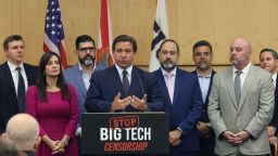 Florida Gov. Ron DeSantis gives his opening remarks flanked by local state delegation members prior to signing legislation that seeks to punish social media platforms that remove conservative ideas from their sites, inside Florida International University's MARC building in Miami on Monday, May 24, 2021. 