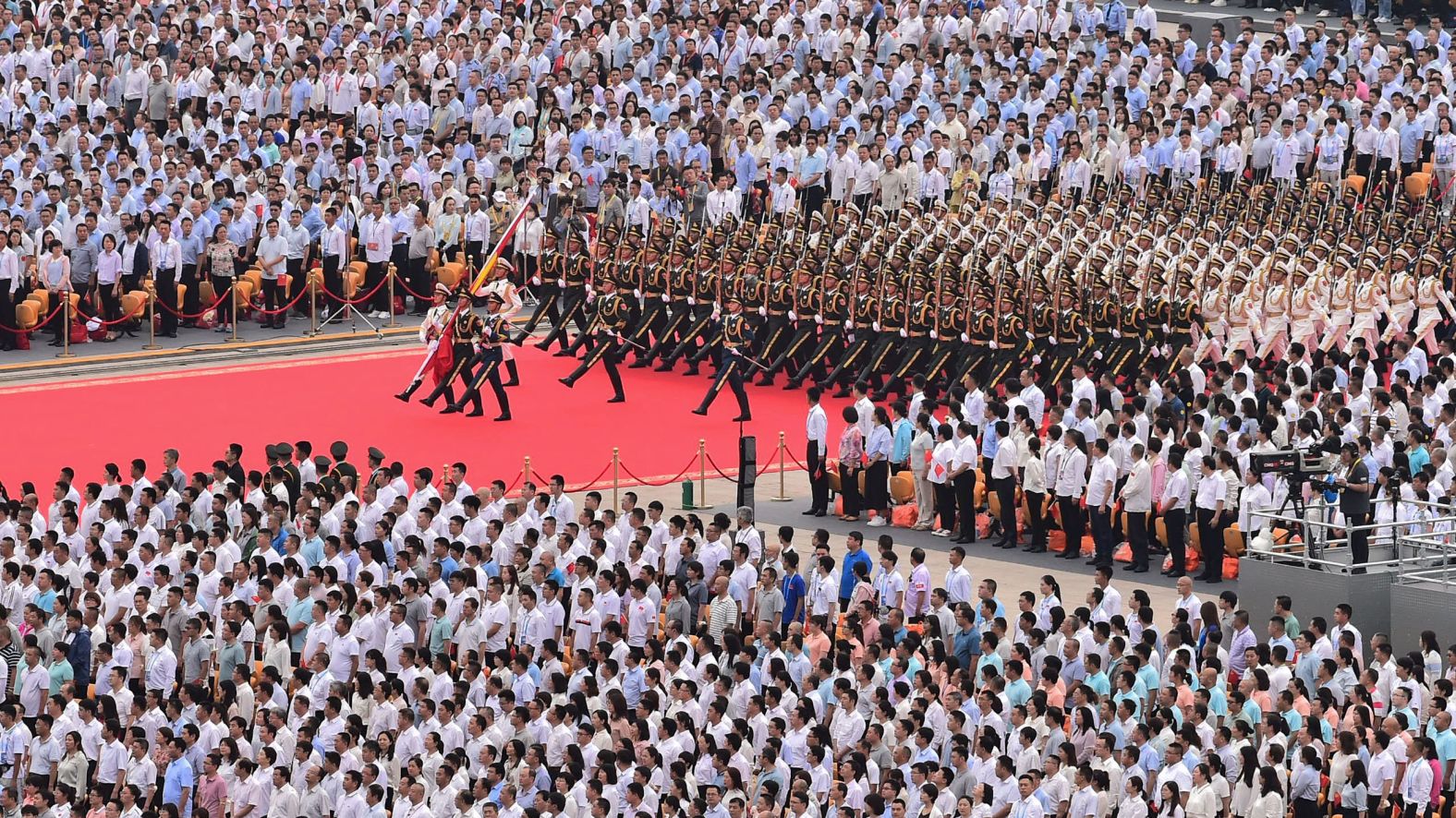 An honor guard marches in Tiananmen Square during a July 2021 celebration marking the 100th anniversary of the Chinese Communist Party.