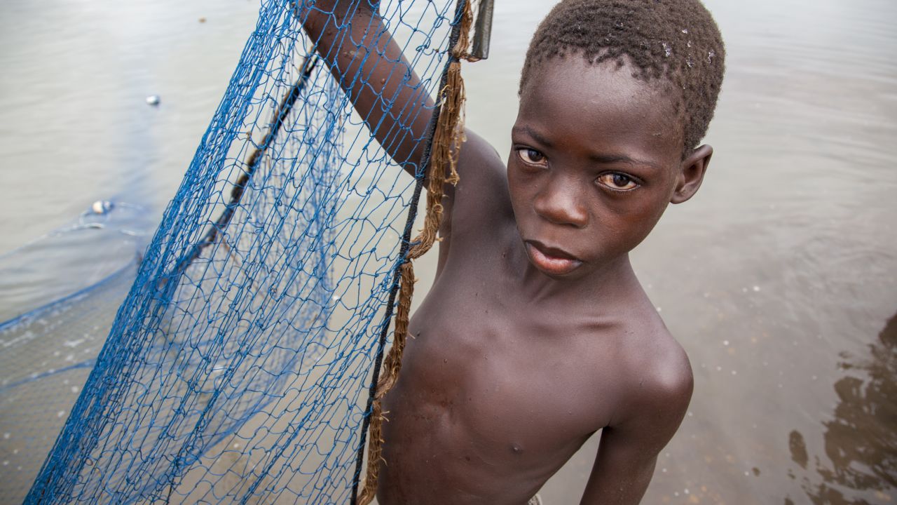 A child working on Lake Volta.
