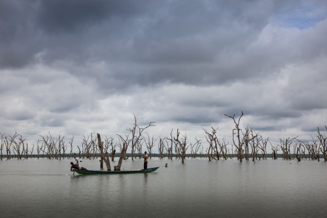 Lake Volta is the world's biggest man-made lake, and trees rise above the water's surface. Fishing nets can become caught on the limbs, and children are made to dive into the water to untangle them. Unable to swim, many children drown.