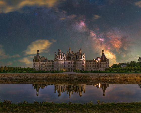 This castle in Chambord, Centre-Val de Loire, France, had intervals of illumination with a minute's pause every 15 minutes. During the pauses, the photographer shot, trying to get as many images as possible. While processing it he had to try to mimic the reflection due to the time delay caused by the castle lights.