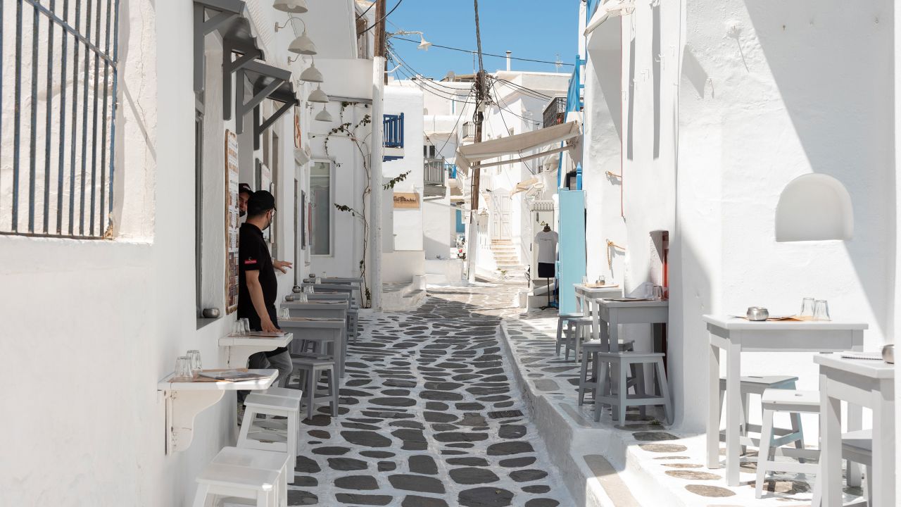 Tourists are expected to return this summer in greater numbers to Greece, visiting the old town in Mykonos and other popular spots.