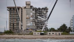 SURFSIDE, FLORIDA - JUNE 29: Search and Rescue teams look for possible survivors and to recover remains in the partially collapsed 12-story Champlain Towers South condo building on June 29, 2021 in Surfside, Florida. Over one hundred people are being reported as missing as the search-and-rescue effort continues. (Photo by Joe Raedle/Getty Images)