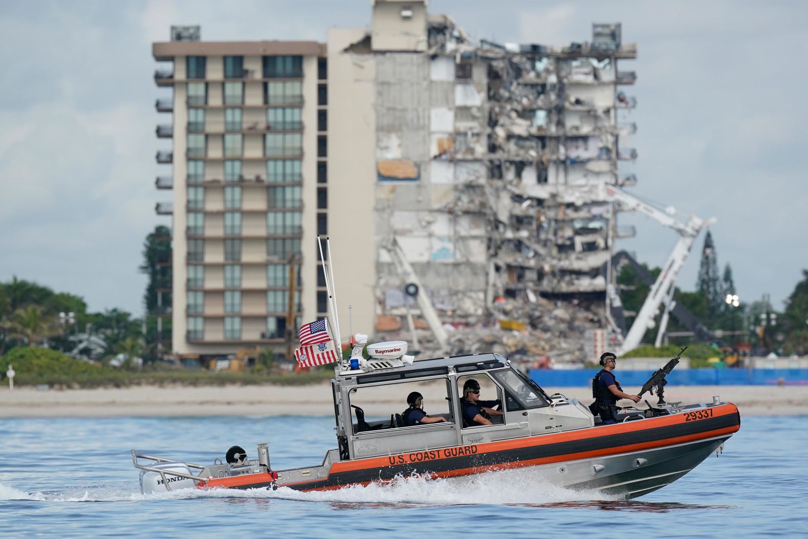 A Coast Guard boat patrols the water ahead of Biden's visit.
