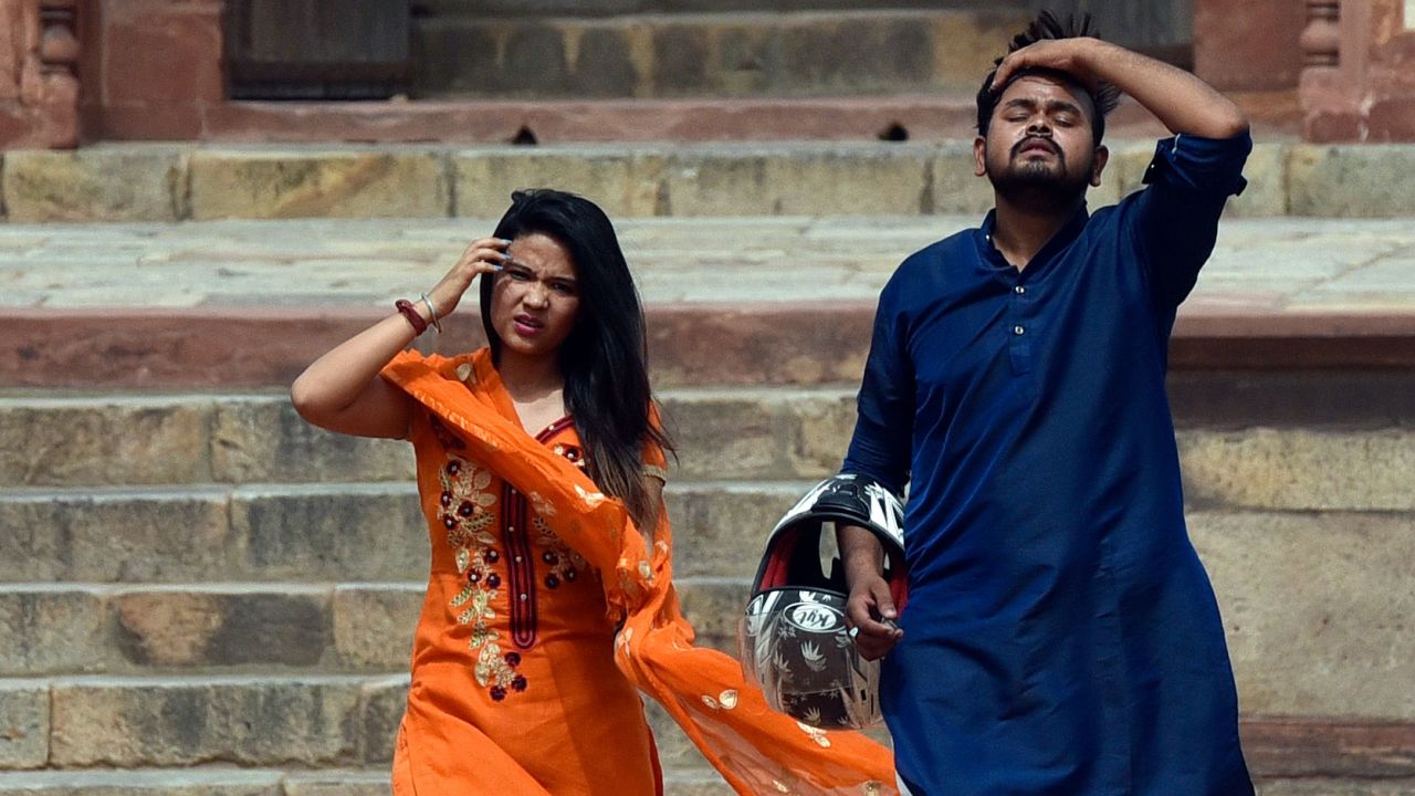 Visitors at Humayun's Tomb in New Delhi, India, on a hot day on June 30 amid a heatwave.  