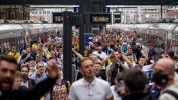 Scotland fans arrive at King's Cross Station in London ahead of its game against England.