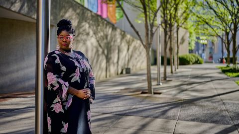 Jennifer Whitcomb-Oliva, an actor, opera performer and vocalist stands outside the Tennessee Performing Arts Center in downtown Nashville.