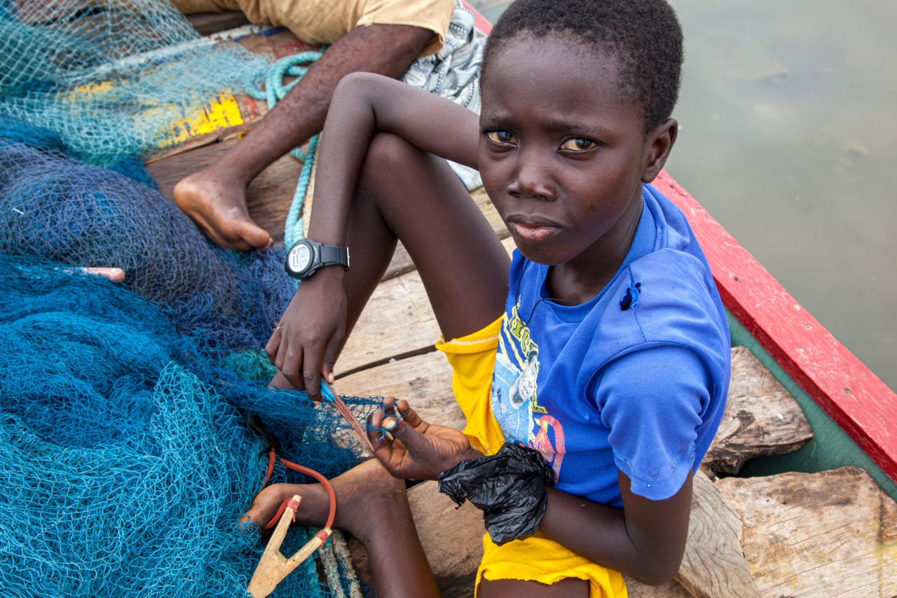 Humanitarian photographer Lisa Kristine took these images of Lake Volta, in Ghana. Here, 20,000 children are working in forced labor, according to the International Labour Organization.