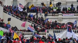 Rioters take over the Inaugural stage during a protest calling for legislators to overturn the election results in President Donald Trump's favor at the U.S. Capitol on January 6, 2021 in Washington, D.C. 
