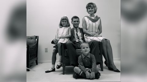 Sheryl Chaffee (left) poses with her father, Roger, her mother, Martha, and her brother, Stephen, for a portrait in their home in 1965, two years before the Apollo 1 fire.