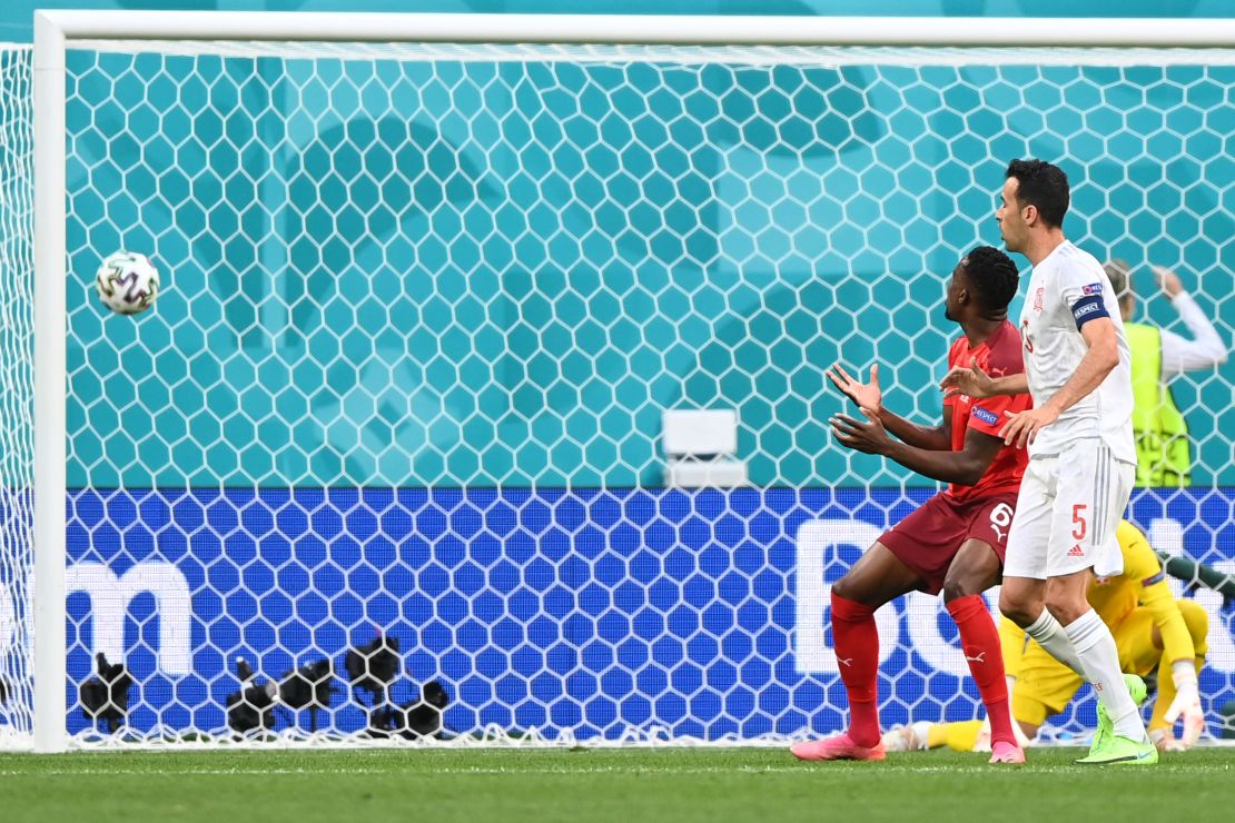Denis Zakaria watches as his deflection puts Spain ahead in the match. 