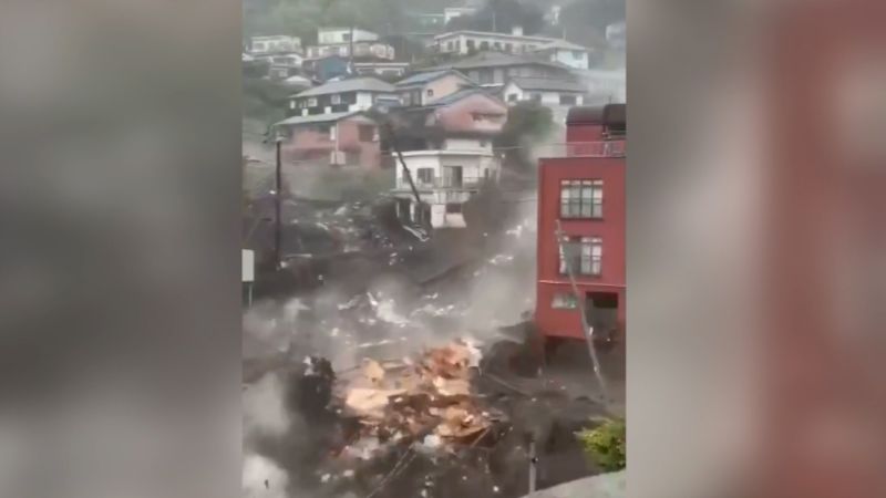 Terrifying video shows landslide sweep through city | CNN
