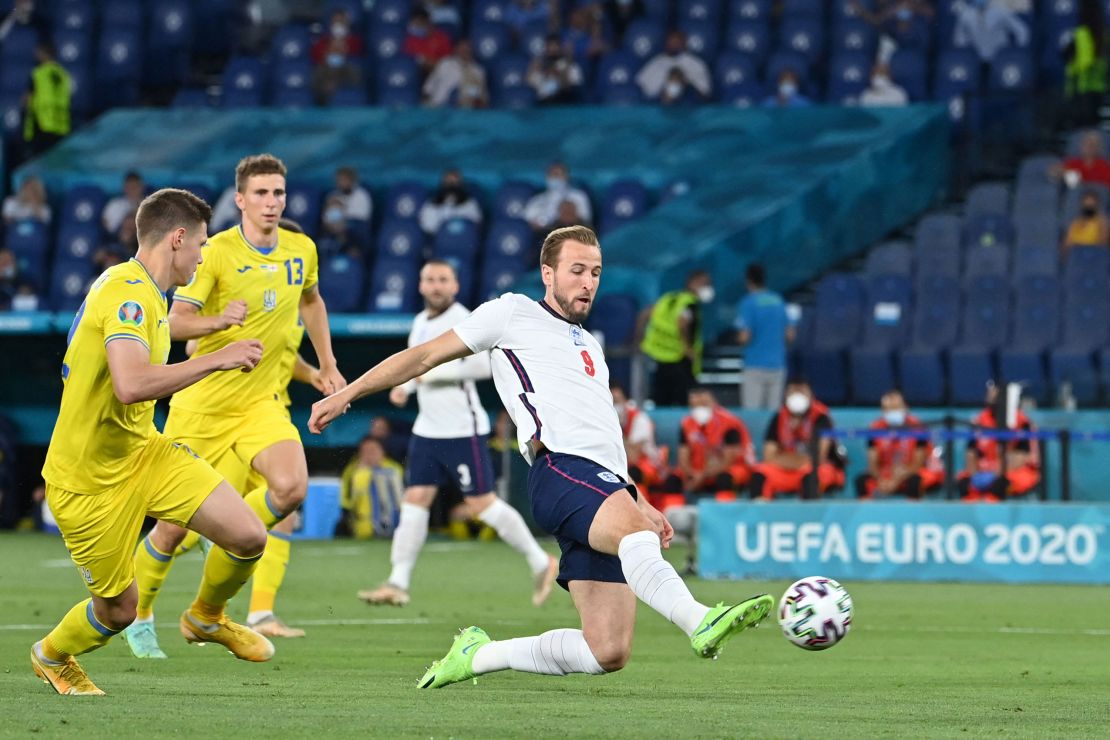 Harry Kane scores the first of his two goals against Ukraine in England's 4-0 win.