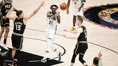 Jrue Holiday #21 of the Milwaukee Bucks passes the ball during the game against the Atlanta Hawks during Game 6 of the Eastern Conference Finals of the 2021 NBA Playoffs on July 3, 2021 at State Farm Arena in Atlanta, Georgia.