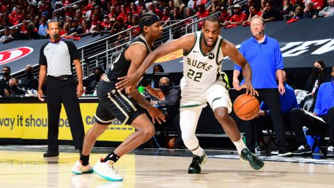 Khris Middleton #22 of the Milwaukee Bucks dribbles the ball during Game 6 of the Eastern Conference Finals of the 2021 NBA Playoffs on July 3, 2021 at State Farm Arena in Atlanta, Georgia.