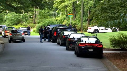 Cobb County police converged on the area after the shooting. 