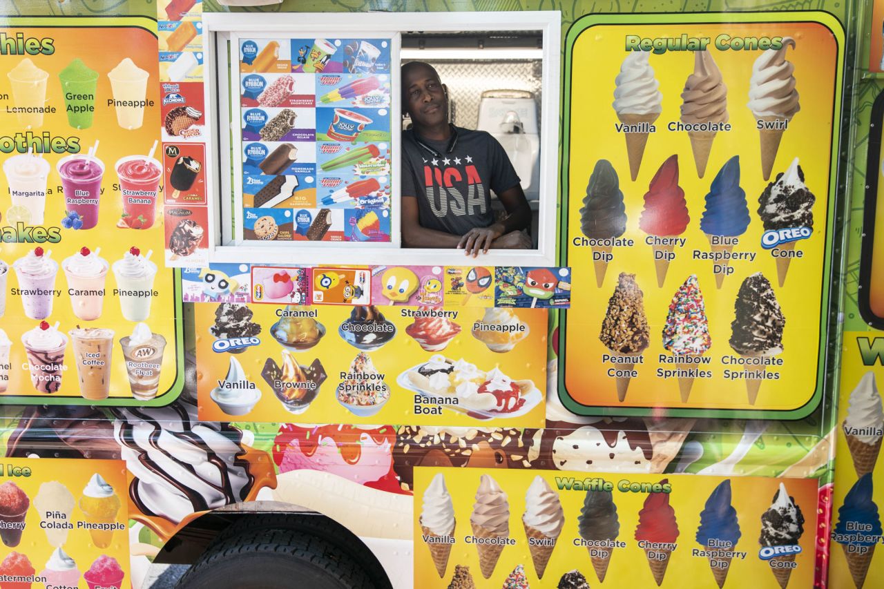 A vendor sells ice cream from a truck near the White House on Sunday, July 4.