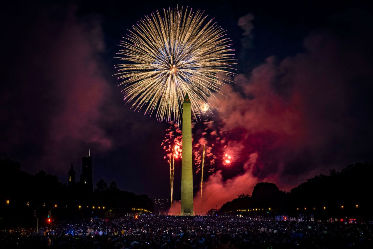 People fill the National Mall to watch the fireworks display during Independence Day celebrations on July 4, in Washington, DC.