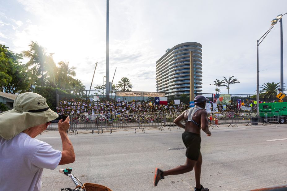 A memorial is seen near the spot where the building used to be. <a href="https://www.cnn.com/2021/07/04/us/miami-dade-building-collapse-sunday/index.html" target="_blank">The rest of the building was demolished</a> on July 4 so that authorities could continue to look for survivors safely, officials said.