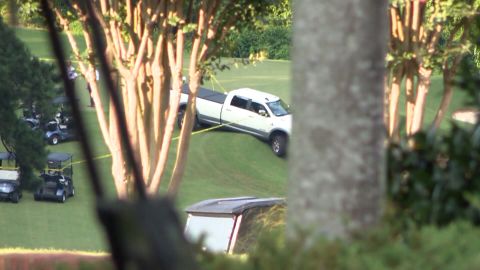 The pickup truck on the 10th green of the Pinetree Country Club.