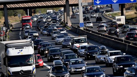 Vehicles are stuck in a traffic jam on the highway on August 1, 2020 near Chasse-sur-Rhone, southeastern France, during a major weekend of the French summer holidays. (Photo by JEFF PACHOUD / AFP) (Photo by JEFF PACHOUD/AFP via Getty Images)
