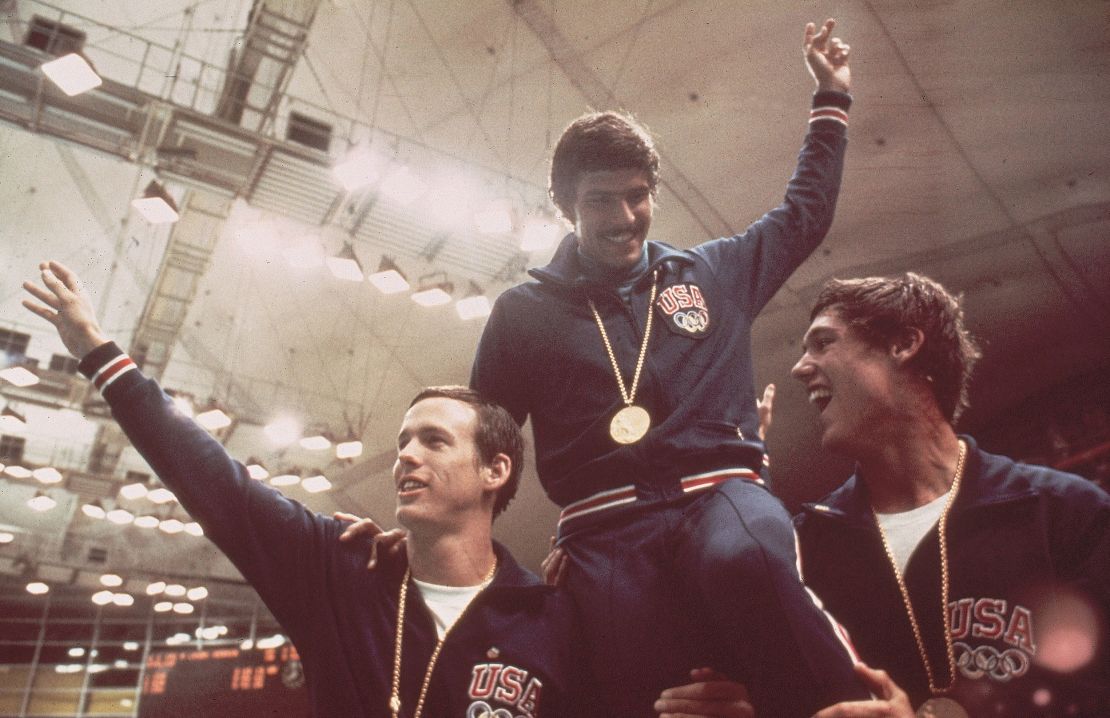 Spitz (center) celebrates relay gold at the 1972 Munich Olympics.