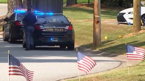 Police near the scene of the shooing in Kennesaw, Georgia.