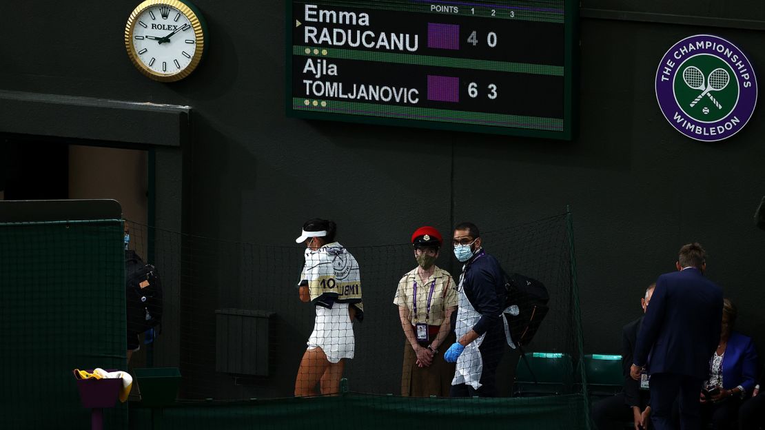 Raducanu goes off court for a medical time out against  Tomljanovic.