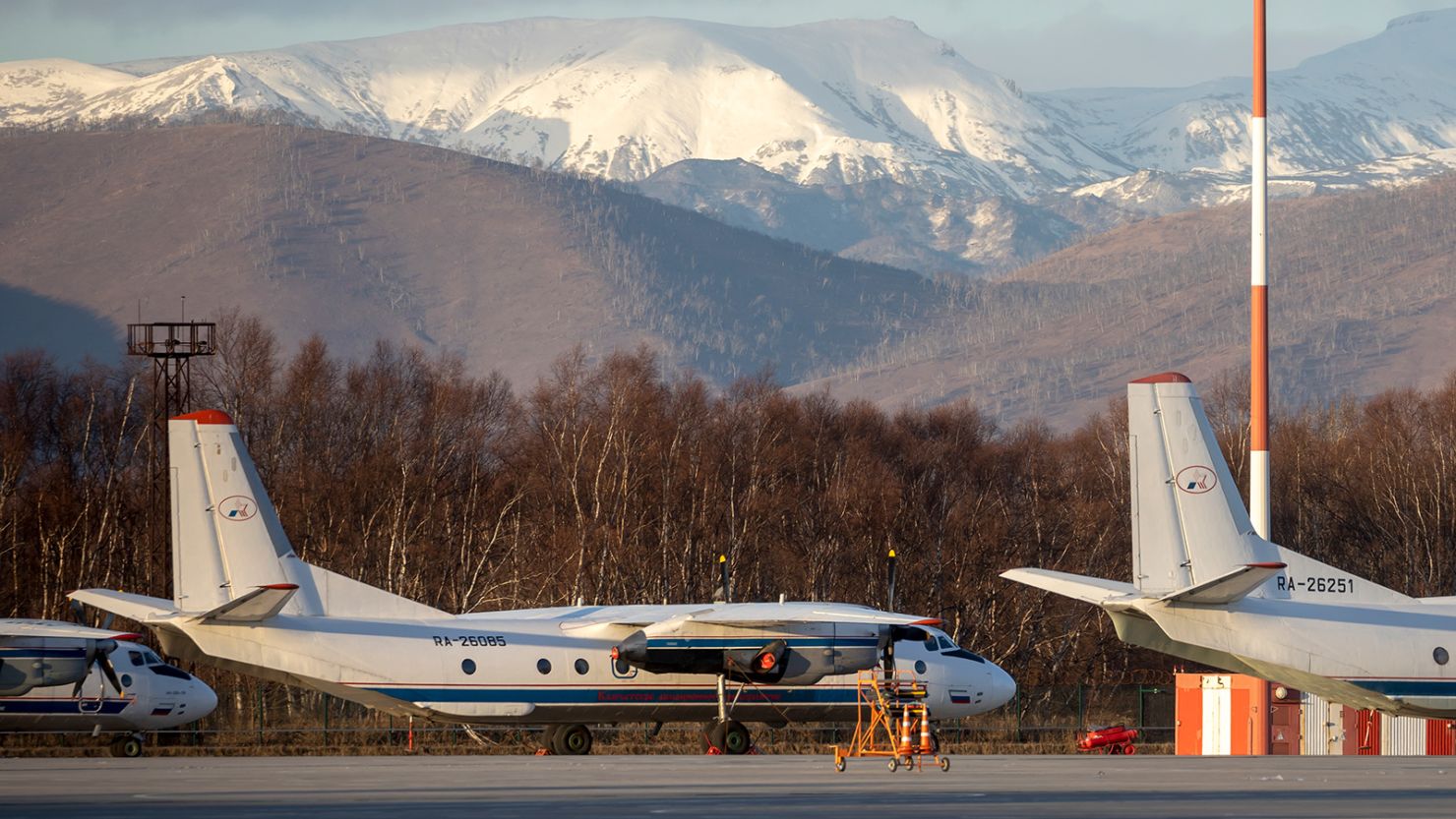 A file photo of an Antonov An-26 twin-engined turboprop, with the same RA-26085 tail number as the missing plane, at an airport outside Petropavlovsk-Kamchatsky, Russia, in November 2020.