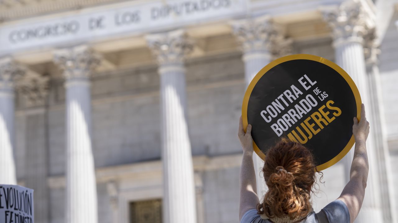 A woman takes part in a protest against sexist violence and for women's rights, in front of the Congress of Deputies in Madrid, Spain on May 18, 2021.