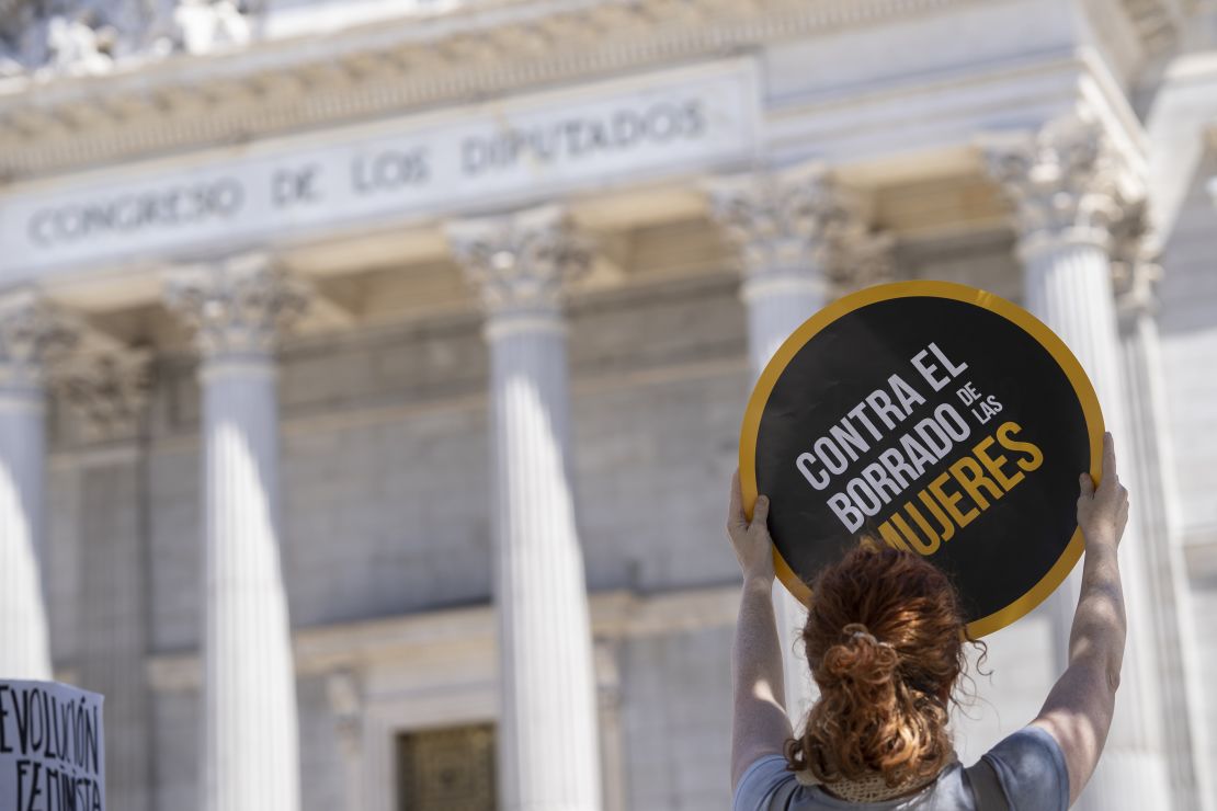 A woman takes part in a protest against sexist violence and for women's rights, in front of the Congress of Deputies in Madrid, Spain on May 18, 2021.