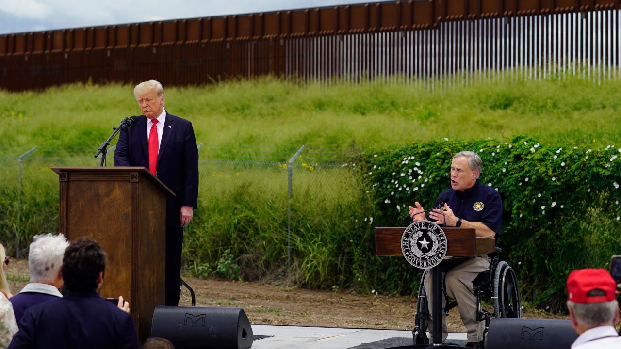 Former President Donald Trump and Texas Gov. Greg Abbott visit an unfinished section of border wall in Pharr, Texas, on June 30.