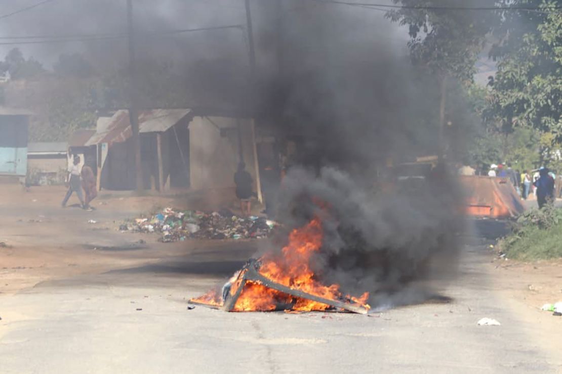A burning barricade in the road in Mbabane, eSwatini, on June 29, 2021. Demonstrations escalated radically in eSwatini as protesters took to the streets demanding immediate political reforms.