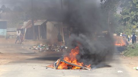 A burning barricade in the road in Mbabane, eSwatini, on June 29, 2021. Demonstrations escalated radically in eSwatini as protesters took to the streets demanding immediate political reforms.
