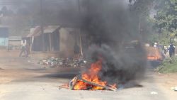 A barricade in the road that is on fire is seen in Mbabane, Eswatini, on June 29, 2021. - Demonstrations escalated radically in Eswatini this week as protesters took to the streets demanding immediate political reforms.
Activists say eight people were killed and dozens injured in clashes with police.
Internet access has been limited while shops and banks are shuttered, straining communication and limiting access to basic goods under a dawn-to-dusk curfew. (Photo by - / AFP) (Photo by -/AFP via Getty Images)