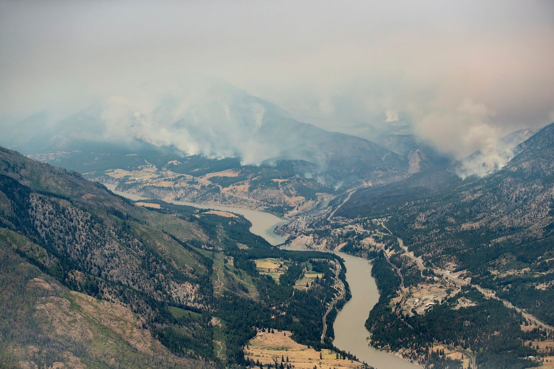 An aerial photo taken from a helicopter shows a wildfire burning in the mountains north of Lytton, British Columbia on July 1.